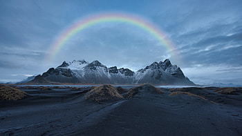 Rainbow Over Snow Covered Mountain HD wallpaper