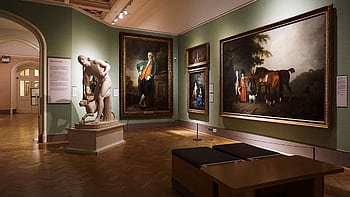 An elegant art gallery room featuring classical paintings and a prominent marble statue. HD wallpaper
