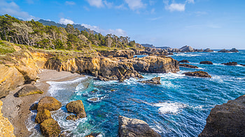 Landscape View Of Green Leaves Trees Stones Rocks On Ocean Waves Under Blue Sky Nature HD wallpaper