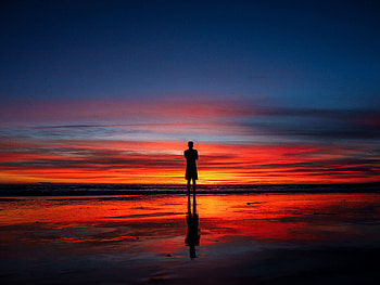 Calm, peace, silhouette, reflections, man and sunset HD wallpaper