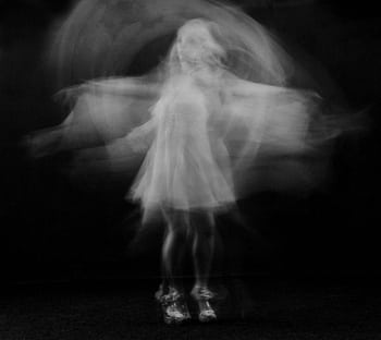 Black and white capturing the graceful motion blur of a ballerina dancing. HD wallpaper