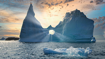 Sunlit iceberg, Majestic landscape, Nature's marvel, Captivating sight HD wallpaper
