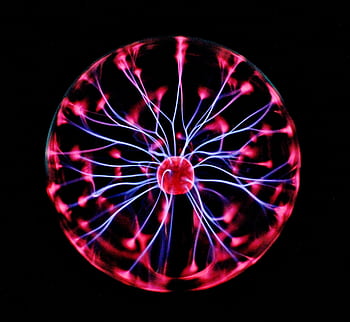 Close-up of a plasma globe with vibrant neon sparks against a dark background. HD wallpaper