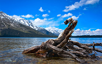 Jenny Lake In Grand Teton National Park - Jackson Hole, Wyoming, mountains, rocks, water, clouds, sky, usa HD wallpaper