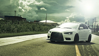 Mitsubishi Lancer Evo X, Sports sedan, Dynamic profile, Thrilling performance HD wallpaper