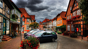 quaint village center, shopping, stores, cars, clouds, village HD wallpaper