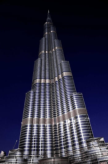 Magnificent night view of the Burj Khalifa, an iconic skyscraper in Dubai, UAE. HD phone wallpaper