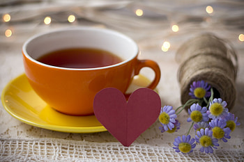 table, bouquet, tea, lights, flowers, cup, heart, drink HD wallpaper