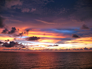 Amazing Sunset, blue, sea, colour, orange, yellow, clouds, sky, water, sun, evening HD wallpaper