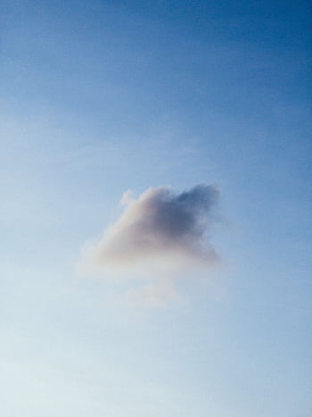 A delicate, fluffy cloud floats in a serene blue sky, embodying tranquility and openness. HD phone wallpaper