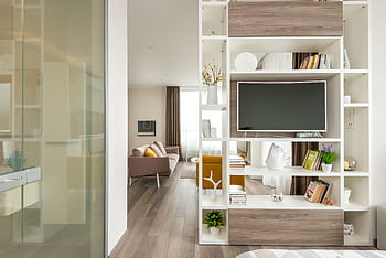Stylish living room with modern decor, spacious layout, and chic furniture. Perfect for a cozy ambiance. HD wallpaper
