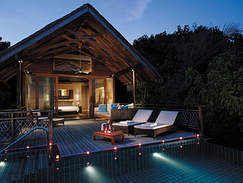 Beach Villa at Night, island, night, tropical, relax, dusk, beach, twilight, candlelight, candles, water, islands, ocean, sunset, swimming, sea, loungers, bungalow, pacific, luxury, exeotic, hotel, paradise, villa, retreat, dark, lights, hut, pool, resort, evening, polynesia HD wallpaper