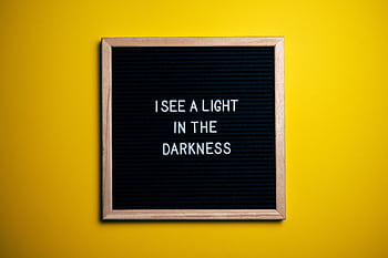 Black letterboard with a motivational quote on a vibrant yellow background. HD wallpaper