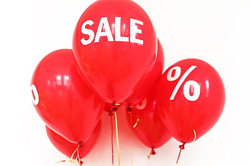 Bright red balloons with 'SALE' and '%' symbols, perfect for marketing promotions. HD wallpaper