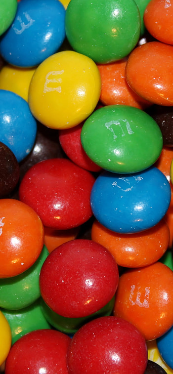 M&M's products, Delicious variety, Mouth-watering choices, Snack time favorites HD phone wallpaper