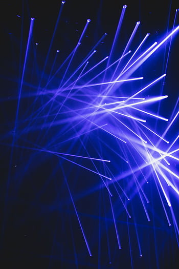 Dynamic blue laser lights create a vibrant and modern visual effect in a dark indoor setting. HD phone wallpaper
