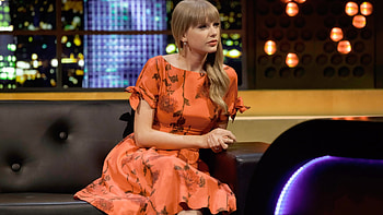 Taylor swift, sit, orange dress, popular singer HD wallpaper