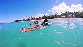 Two Attractive Surf Girls Laying On Surfboard Waiting To Catch Wave, Surfing Stock Video Footage - VideoBlocks HD wallpaper
