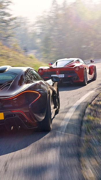 Ultimate Supercar Duel: Ferrari LaFerrari & McLaren P1, Ferrari, McLaren, black car, supercar, vehicle, car HD phone wallpaper
