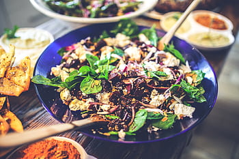 Healthy vegan salad with spinach, tofu, and mixed greens in a bowl, perfect for a nutritious meal. HD wallpaper