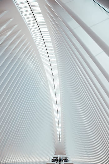 Interior view of the modern and bright Oculus terminal in New York City, showcasing futuristic design. HD phone wallpaper