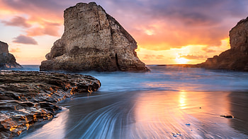 Shark tooth beach, rocks, cliff, sunset HD wallpaper