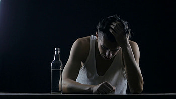 depressed man drinking alcohol alone in a dark room. man in despair Stock Video Footage - VideoBlocks HD wallpaper