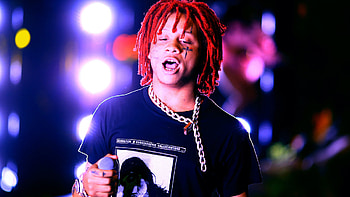 Red Braided Hair Trippie Redd Is Standing In Colorful Lights Background Wearing Black T-Shirt Trippie Redd HD wallpaper