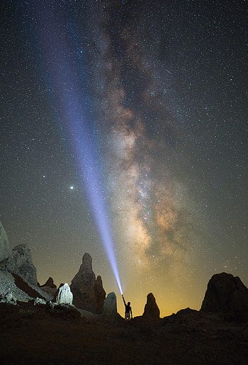 Rocks, Silhouette, Miscellanea, Miscellaneous, Starry Sky, Lantern, Lamp, Glow, Human, Person HD phone wallpaper