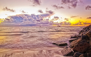 Sunrise, boat, colorful, sand, colors, peaceful, beauty, beach, sailboats, waves, impossible, boats, ocean, sunset, sea, beautiful, sailboat, rocks, summer, pink, yellow, view, clouds, sailing, nature, sky, lovely, splendor, dream HD wallpaper