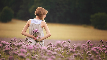 Girl With Flowers Standing In Field, girls, field, flowers, model HD wallpaper