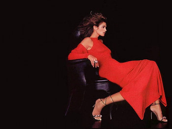 Cindy Crawford - lady in red, style, supermodel, famous, 90s, passion, sensual, makeup, sexy, splendid, foot, brunette, eyes, woman, star, fashion, pretty, face, tempting, legs, chair, red dress, long hair, beauty, celebrity, big hair, cindy crawford, lady in red, lips, long dess, high heels, beautiful, red, gown HD wallpaper