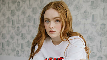 Girl Model Sadie Sink Is Sitting In Blur Background Wearing White Dress Girls HD wallpaper