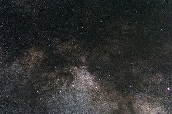 A breathtaking view high above our planet, capturing the beauty of a star-filled night sky and galaxy. HD wallpaper