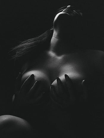 A dramatic black and white artistic nude graph featuring a woman in a sensual pose. HD phone wallpaper