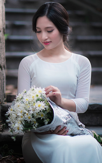 Serene Elegance: Asian Model in White with Daisies, black hair, mood, bouquet, white dress, model, woman, asian HD phone wallpaper