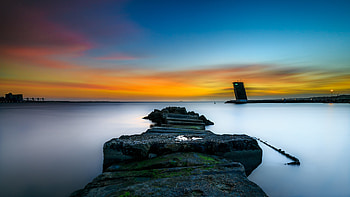 Coast, sunset, rocks, sky, pier HD wallpaper