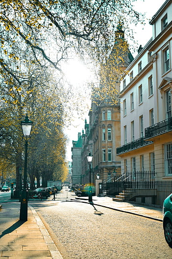 A sunny day in London's iconic streets, showcasing classic architecture. HD phone wallpaper