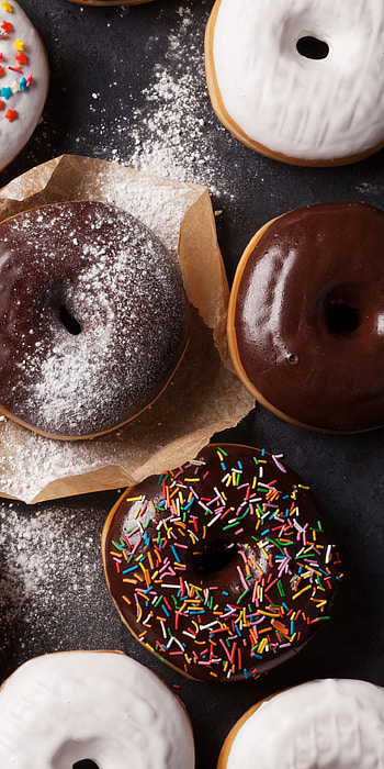 Mouthwatering donuts, Colorful sprinkles, Sweet sensation, Fluffy goodness HD phone wallpaper