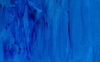 A close-up of a vibrant blue abstract painting with rich textures on canvas. HD wallpaper