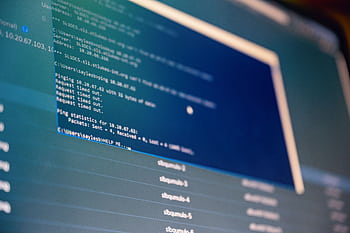 Close-up of digital data analysis displayed on a computer monitor with blue tones. HD wallpaper