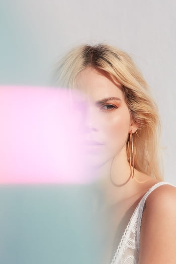 Stylized portrait of a woman with soft lighting and colorful overlay. HD phone wallpaper