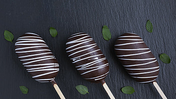 Decadent chocolate candy, Irresistible sweet treats, Rich and creamy delight, Sinfully delicious HD wallpaper