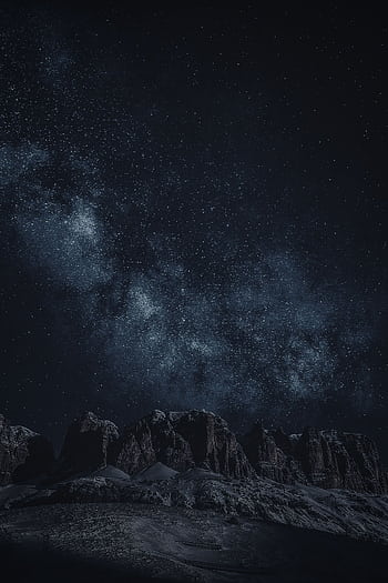 Stunning view of the starry night sky with rocky mountain silhouettes. HD phone wallpaper