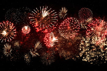 Vibrant fireworks light up the night sky in a breathtaking celebration in Vaughan, Ontario. HD wallpaper