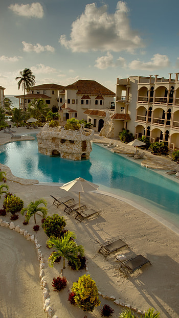 Belize resort getaway, Relax by the pool, Sun-kissed paradise, Architectural beauty HD phone wallpaper