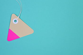 Minimalist of a colorful triangle tag on a teal background, perfect for design projects. HD wallpaper