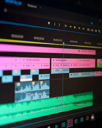 Close-up of a video editing timeline on a professional software interface. HD phone wallpaper