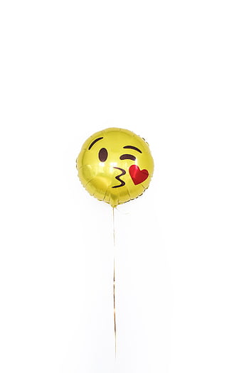 Yellow emoji balloon with heart eyes on a white background, perfect for celebrations. HD phone wallpaper