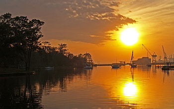 Sunset , skies, sunrise, boats, clouds, trees, dock, water, sun, sunset HD wallpaper